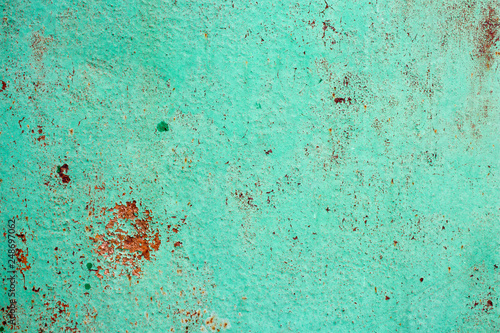 iron sheet in green paint and with rusty spots