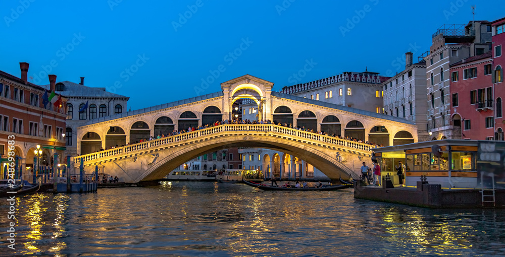Italy beauty, evening with Rialto bridge on Grand canal street in Venice, Venezia