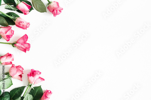 Flowers composition. Pink rose flowers on white background. Valentines day, mothers day, womens day concept. Flat lay, top view, copy space