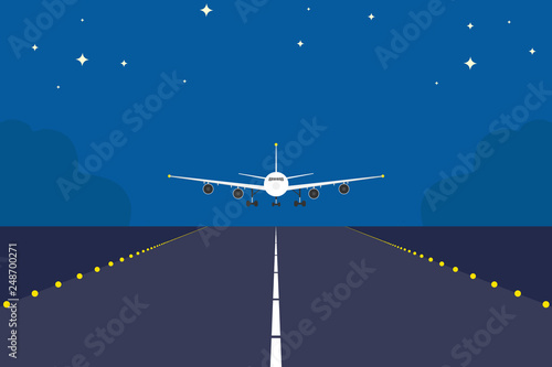 Landing plane over runway at night. Flat and solid color travel concept background. Airplane sunrise landing. photo