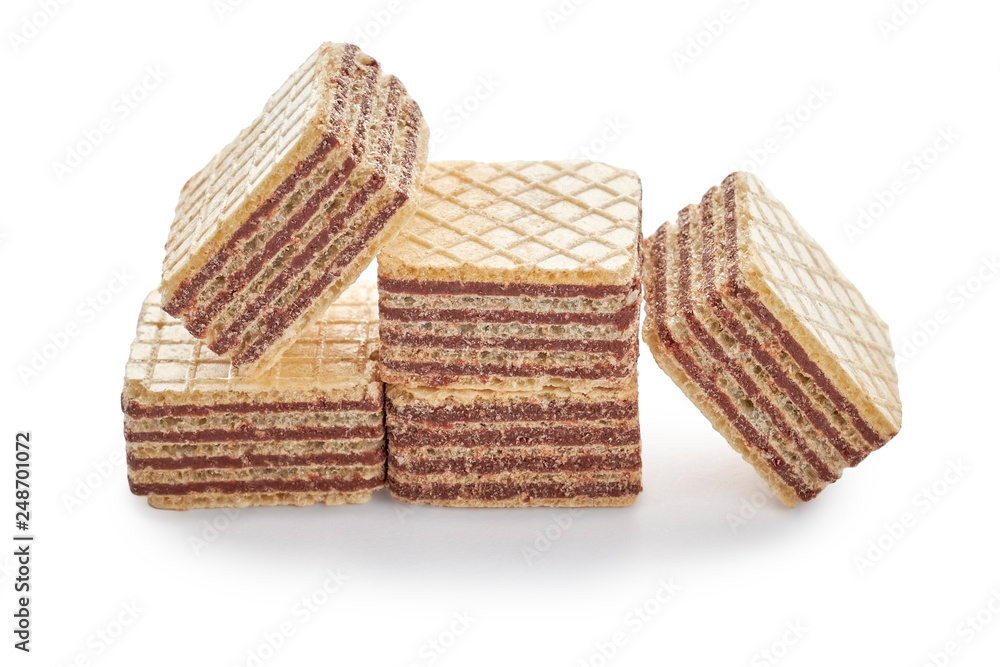 Pile of wafer biscuits cubes isolated on white background. Pile of wafer biscuits cubes isolated on white background.