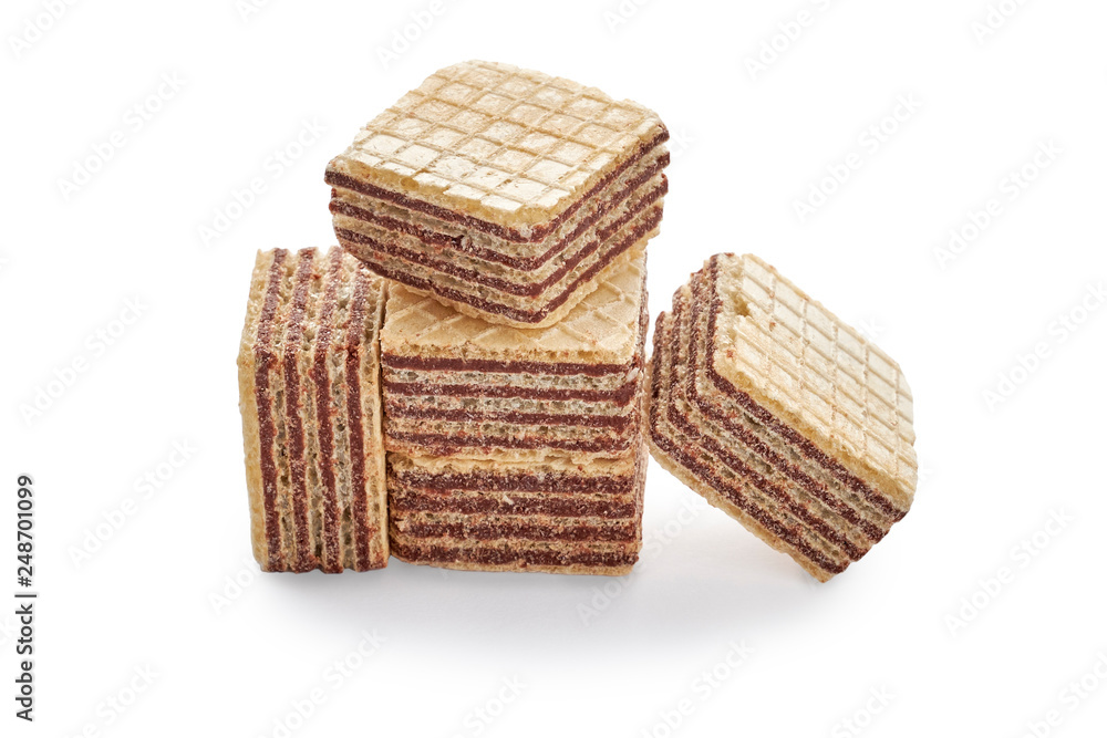 Stack of wafer biscuits cubes isolated on white background. Stack of wafer biscuits cubes isolated on white background.