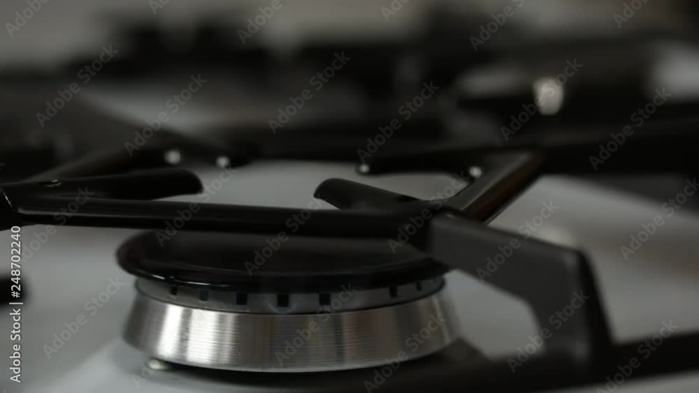 gas is ignited in a gas stove gas is ignited in a gas stove