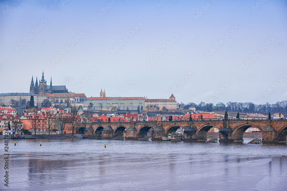 view of the Vltava, Charles Bridge and Mala Strana in Prague.