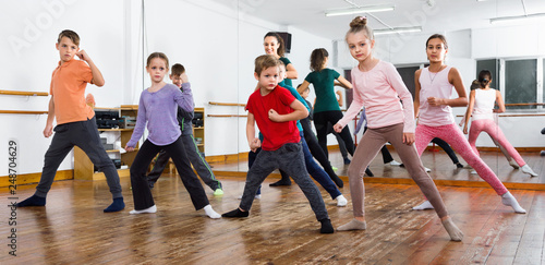 Children dancing contemp in studio smiling and having fun