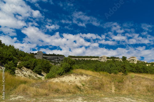 Mountain landscape with blue sky and clouds