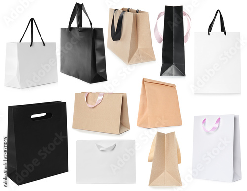 Set of different paper bags for shopping on white background. Mockup for design