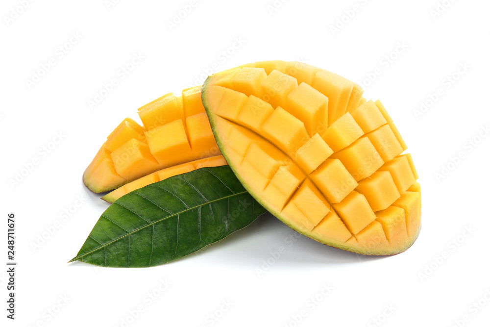 Cut ripe mango on white background. Tropical fruit