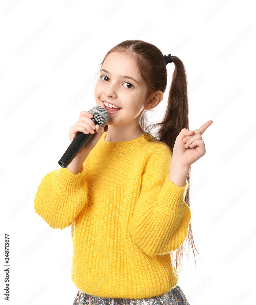 Little girl singing into microphone on white background Little girl singing into microphone on white background