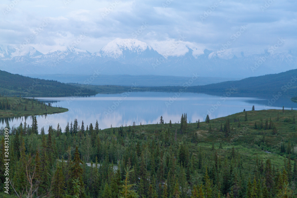 Mt. Denali reflected in Wonder Lake at sunset in Denali National Park, Alaska, USA.