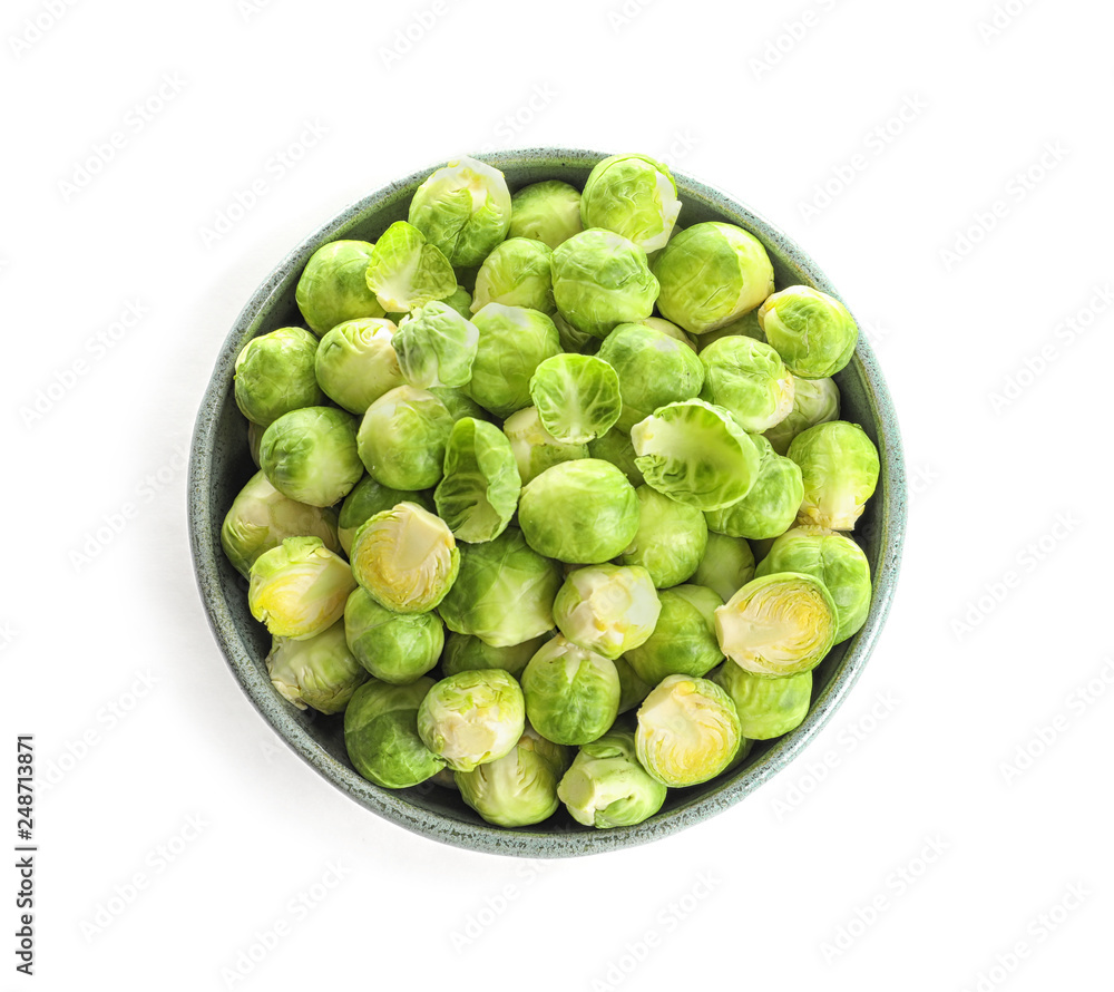 Bowl of fresh Brussels sprouts isolated on white, top view Bowl of fresh Brussels sprouts isolated on white, top view