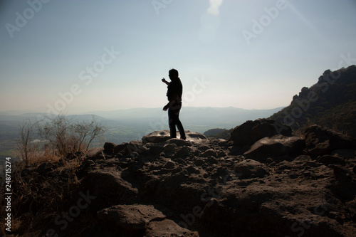 Man from behind the horizon in the chasm of a viewpoint that is in a state of Mexico in the great hill of the speaker