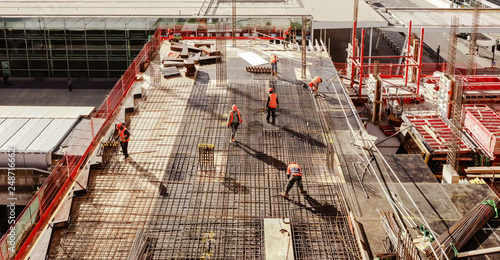 фотографія High angle workers in construction site