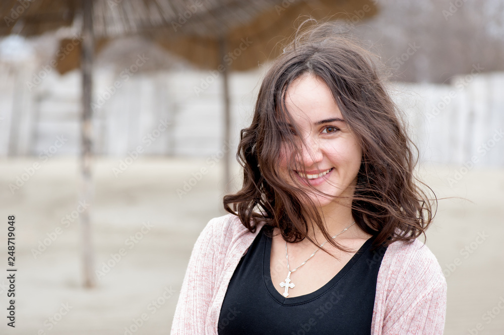Happy girl, Portrait of beautiful sensitive young girl or woman posing outdoors in casual clothes with smile and adorable eyes Happy girl, Portrait of beautiful sensitive young girl or woman posing outdoors in casual clothes with smile and adorable eyes