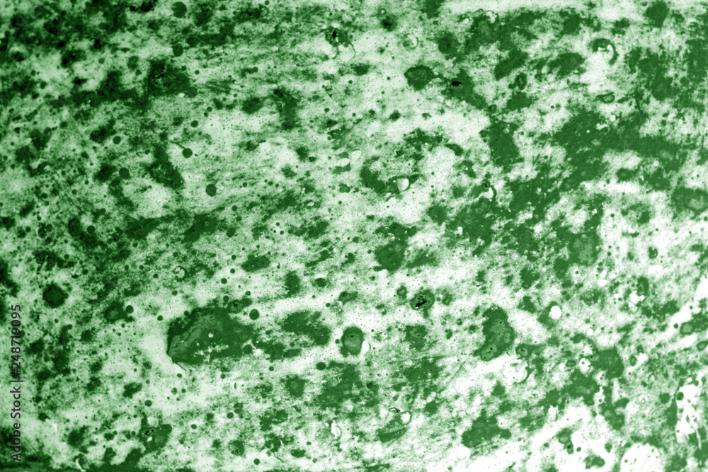 Fototapeta premium Part of old ceramic plate close-up in green tone.