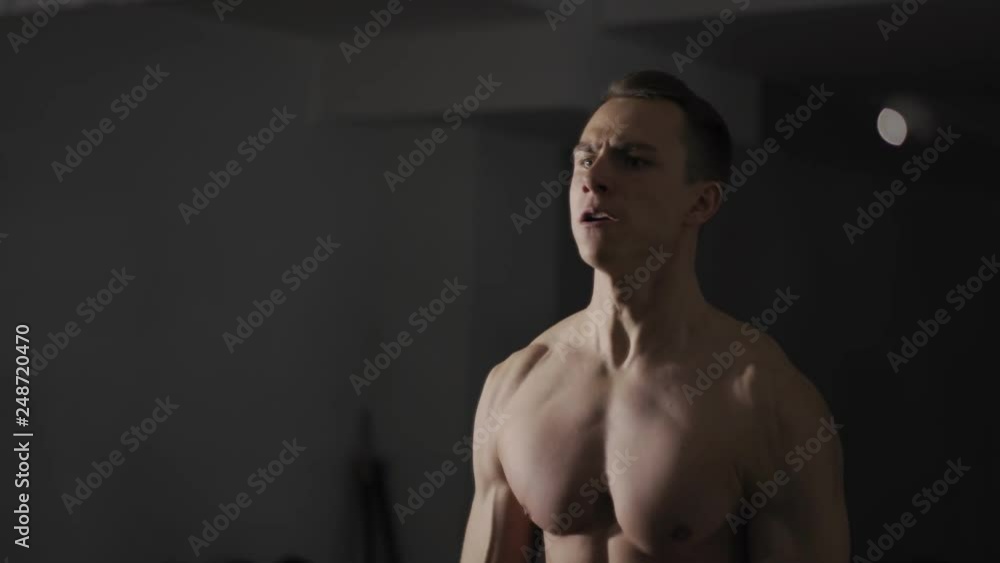 Close up of man exercising with dumbbell Close up of man exercising with dumbbell