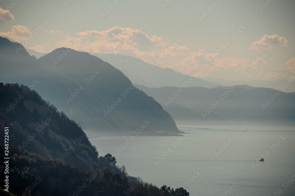 Amazingly beautiful background of Caucasus mountains and clear sea water