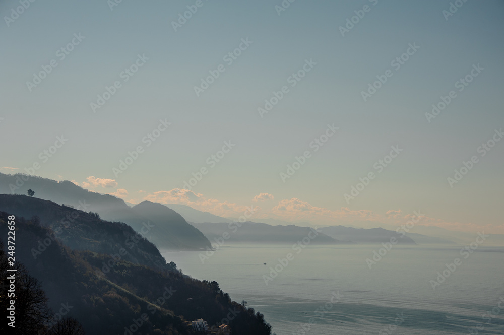 Fototapeta premium Beautiful view on the Caucasus mountains and clear sea water