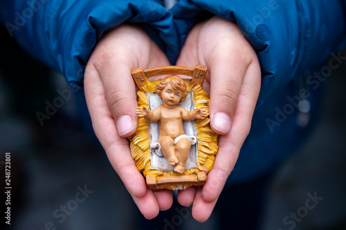 Vatican City, December 11, 2016: Children take Baby Jesus from their Nativity Scene (Tradition Bambinelli) to be blessed by Pope Francis during his Sunday Angelus prayer in st. Peter's Square