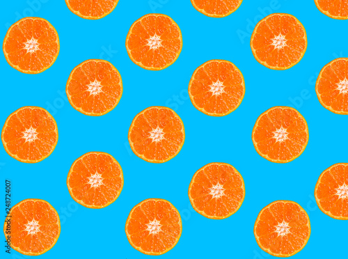 Tangerine slices on blue