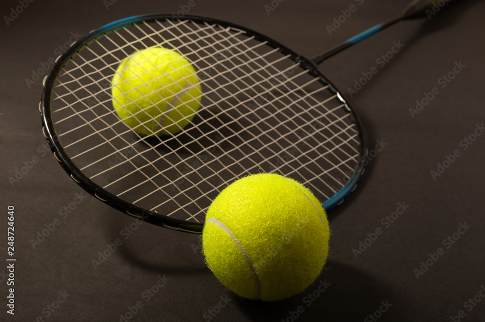tennis ball and racket