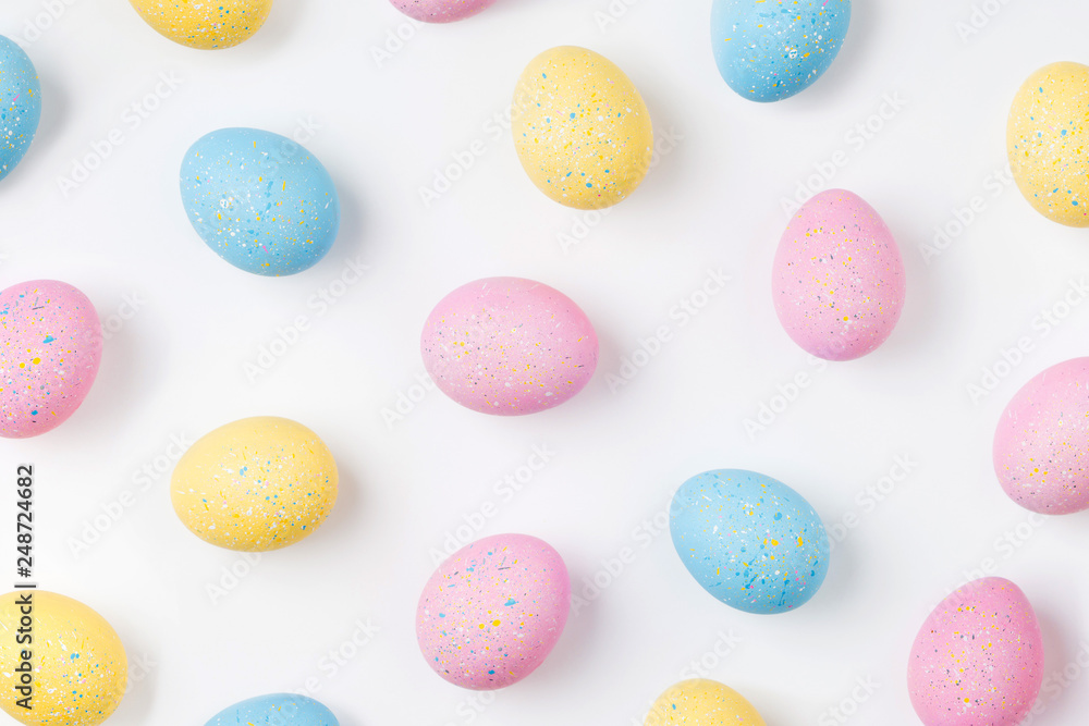 Background with pale pink, blue, yellow Easter eggs. Compositions in pastel colors. Easter concept Background with pale pink, blue, yellow Easter eggs. Compositions in pastel colors. Easter concept