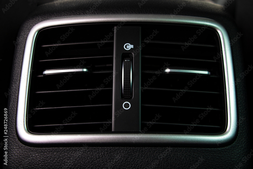 Interior of a modern car, car air conditioning.