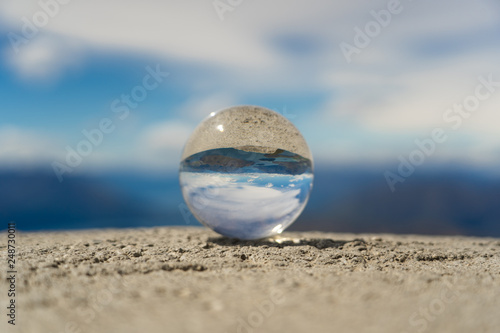 lensball on top of Roys peak, crystal glas ball on top of Roys peak, glas ball on top of a mountain in New Zealand, great Roys peak in wanaka New Zealand