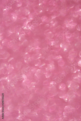 Abstrast blurred glittery shiny background, cold pink, defocused