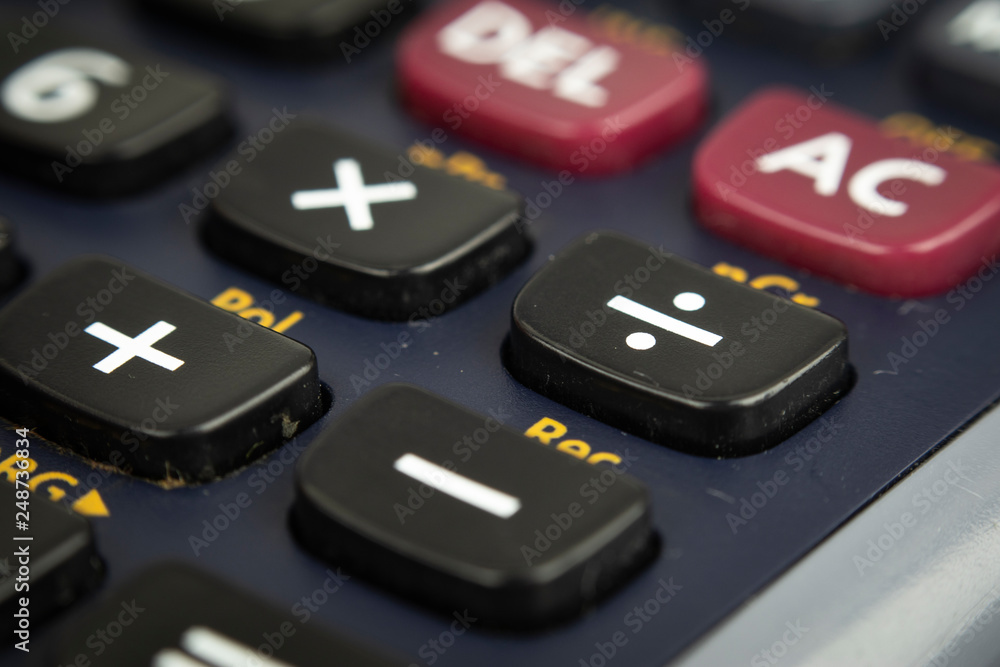 Closeup or macro photo of the scientific calculator buttons. Keys include the mathematical terms. Numerical operation concept. Closeup or macro photo of the scientific calculator buttons. Keys include the mathematical terms. Numerical operation concept.