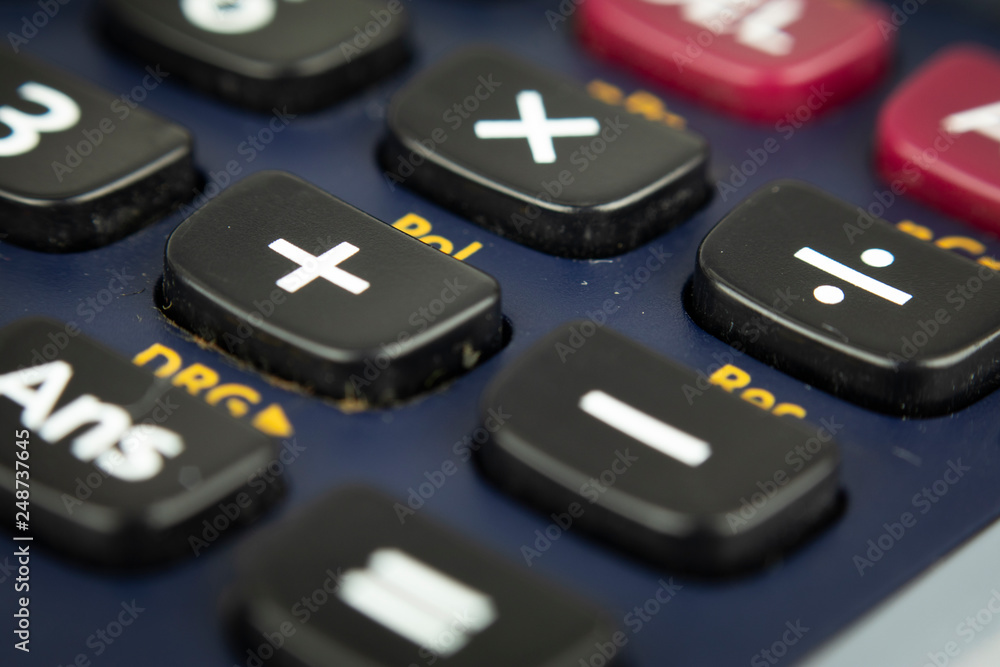 Closeup or macro photo of the scientific calculator buttons. Keys include the mathematical terms. Numerical operation concept. Closeup or macro photo of the scientific calculator buttons. Keys include the mathematical terms. Numerical operation concept.