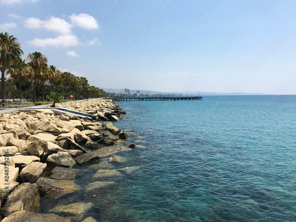 Fototapeta premium Landscape of wooden deck and blue water see