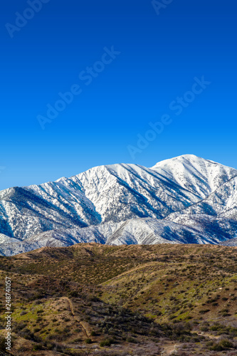 Vertical image of the snow covered San Gabriel Mountains in the Angeles National Forest in Southern California