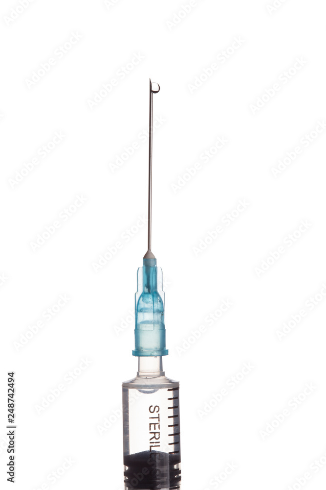 Syringe with an injection solution on white background with copy space Syringe with an injection solution on white background with copy space