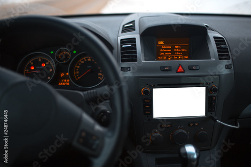Close-up of car dashboard with mockup on audio system.