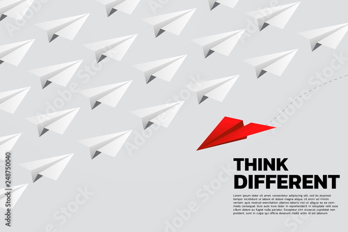red origami paper airplane go different way from group of white. Business Concept of disruption and vision mission.