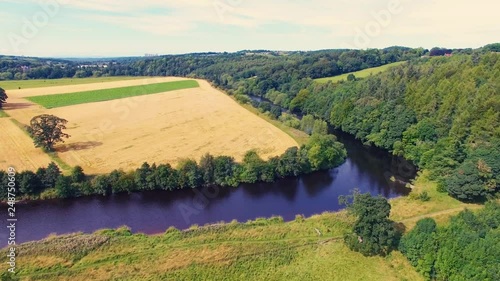 Aerial drone footage overflying the River Clyde in Mauldslie Estate, Lanarkshire, Scotland. photo