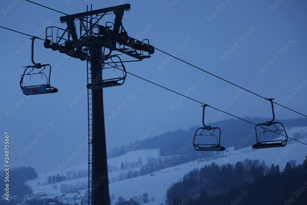 Chairlift in the evening during winter. The Sudety Mountains Chairlift in the evening during winter. The Sudety Mountains