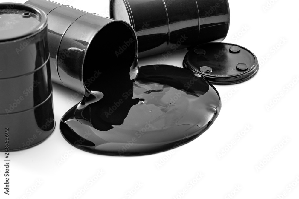 Environmental pollution, fossil fuel production and greenhouse gas concept  theme with oil barrels and black pool of toxic petroleum spilled leaking  from a barrel isolated on white background foto de Stock
