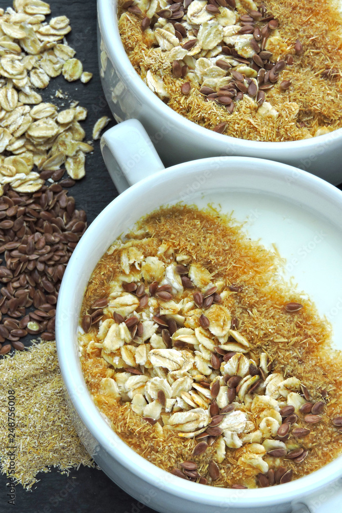 Healthy breakfast with white yogurt or kefir with flax seeds, oatmeal and bran. Superfood Fermented dairy products Healthy breakfast with white yogurt or kefir with flax seeds, oatmeal and bran. Superfood Fermented dairy products
