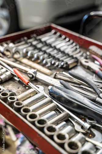 Tool box wagen. Toolset with wrenches, ring spanners, hammer, pliers, screwdrivers, monkey wrenches, screws, bolts, wire and other do-it-yourself (DIY) tools. Car Repair