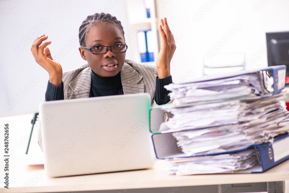 Black female employee unhappy with excessive work Black female employee unhappy with excessive work