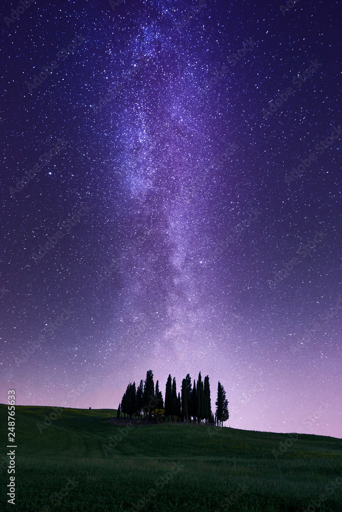 Milky Way Galaxy and Tuscany landscape