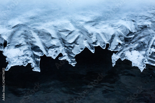 Dramatic patterns in the ice at Blackledge Falls Park, Connecticut. photo