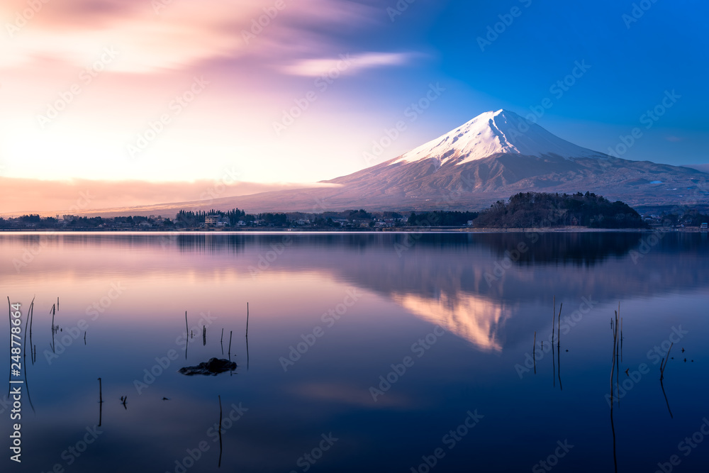 Fuji mountain in the morning twilight sky and reflection on the lake kawakuchiko