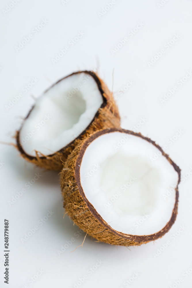 Fresh coconuts on the rustic background. Selective focus. Shallow depth of field. Fresh coconuts on the rustic background. Selective focus. Shallow depth of field.