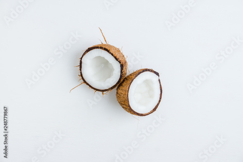 Fresh coconuts on the rustic background. Selective focus. Shallow depth of field.