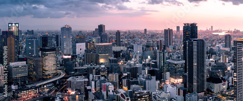 Fotografi Panorama of downtown city skyline at Umeda.