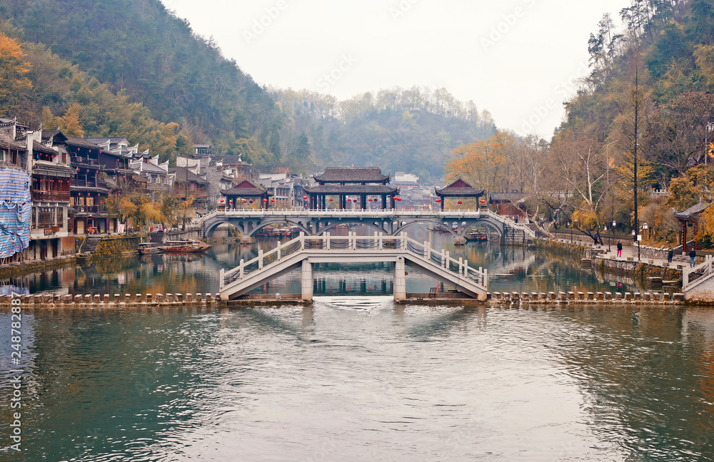 The traditional bridges over the Tuojiang River (Tuo Jiang River) in Fenghuang old city (Phoenix Ancient Town),Hunan Province, China.