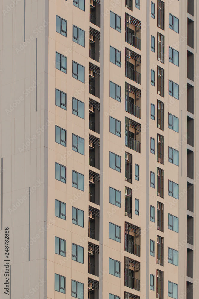Fototapeta premium The windows of condominiums arrange as beautiful pattern